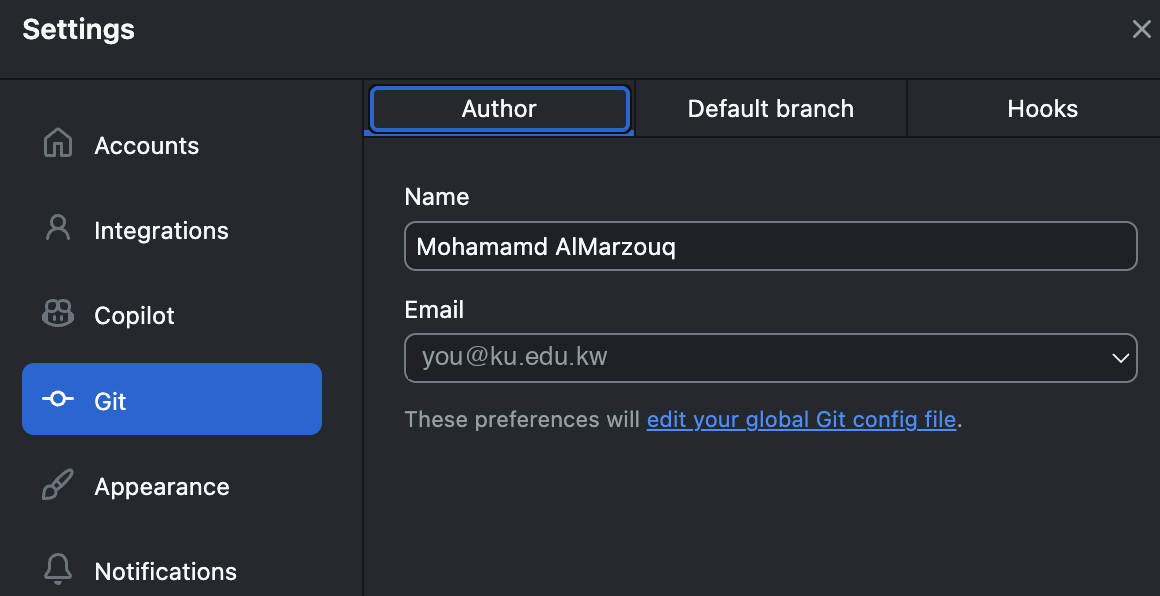 GitHub Desktop&rsquo;s Settings window with Git selected in the left-hand list and the Author tab open. It has a Name field holding a full name, an Email field below it with a dropdown arrow, and a line underneath saying these preferences will edit your global Git config file.