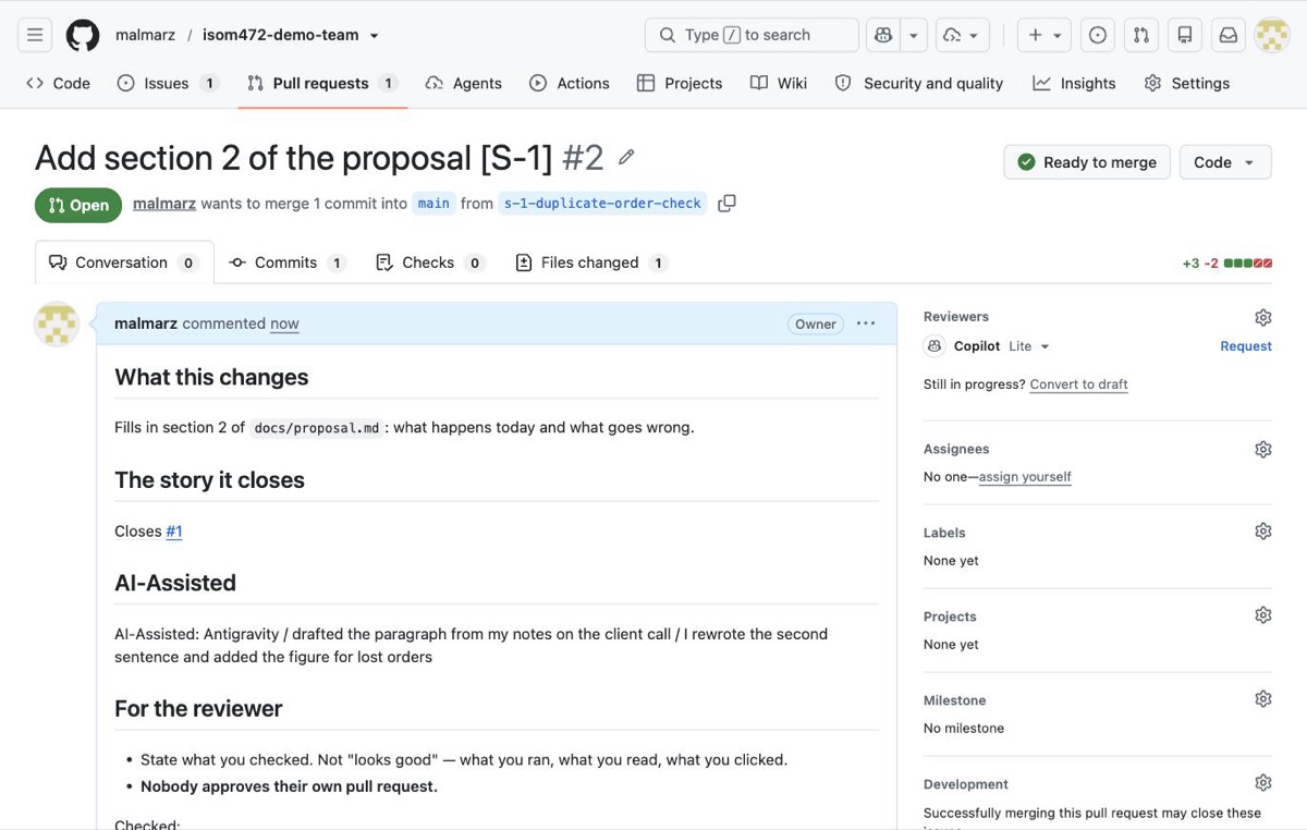 An open pull request titled &ldquo;Add section 2 of the proposal [S-1] #2&rdquo;, merging the branch s-1-duplicate-order-check into main. The body is written under the template headings: What this changes, The story it closes with &ldquo;Closes #1&rdquo;, AI-Assisted naming the tool and what the author rewrote, and For the reviewer.